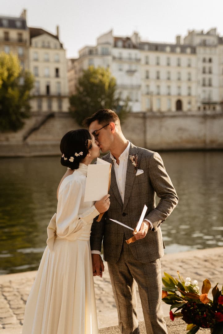 paris elopement wedding vows exchange by the seine river