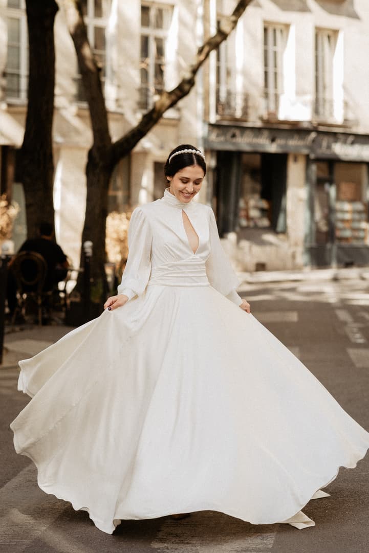 bride dancing around paris wedding