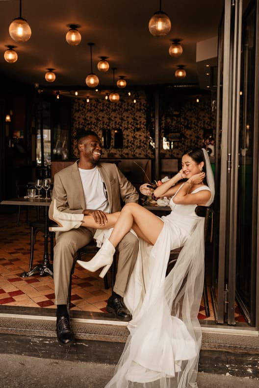 Couple sitting at a cafe terrase