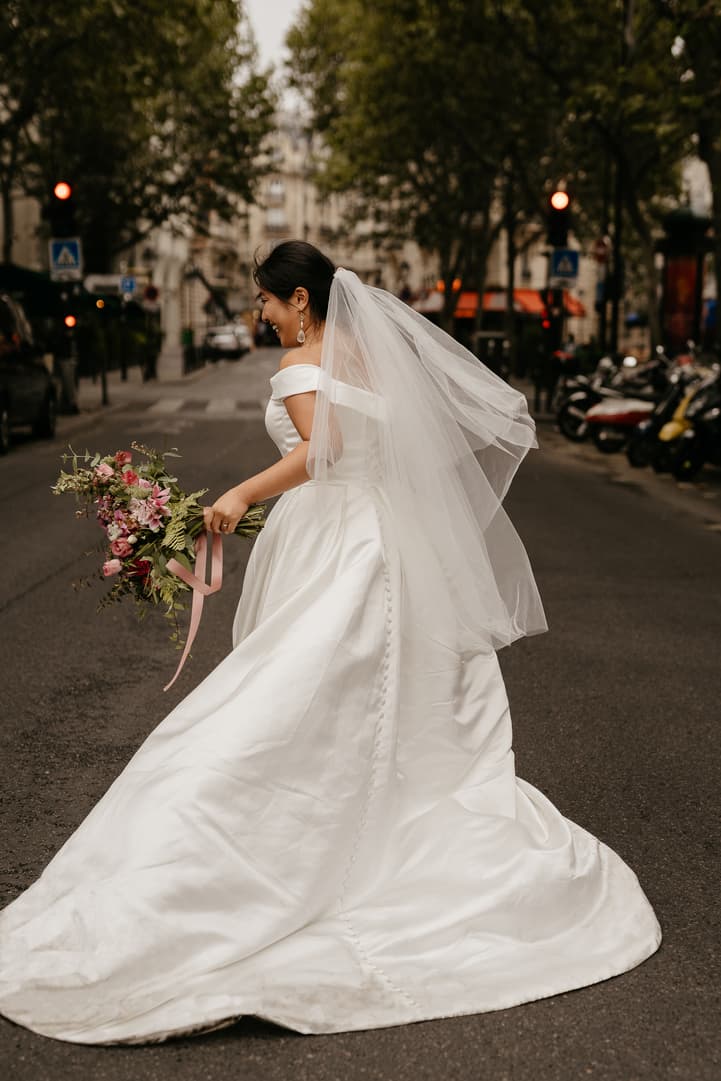 Haruka twirling her gown in a Paris street