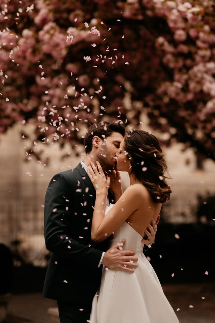 Cherry blossoms spring couple elopement wedding Paris street photoshoot