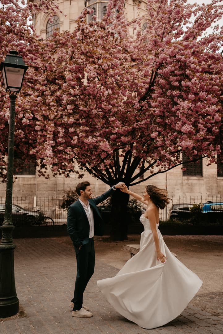 Cherry blossoms spring couple elopement wedding Paris street photoshoot