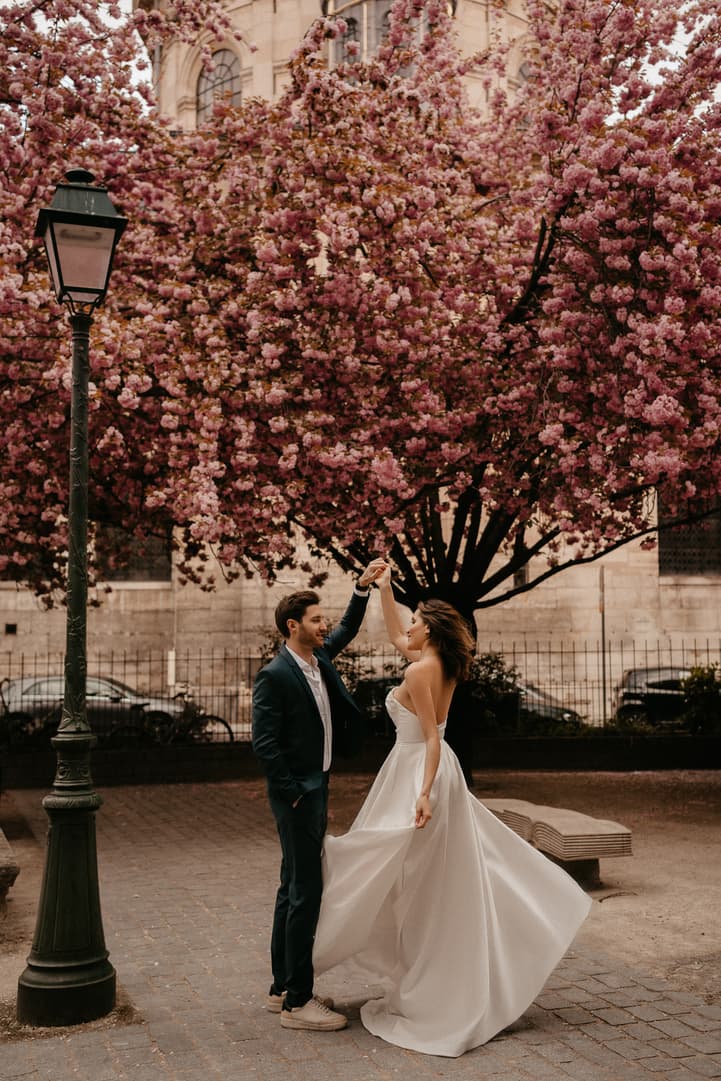 Cherry blossoms spring couple elopement wedding Paris street photoshoot