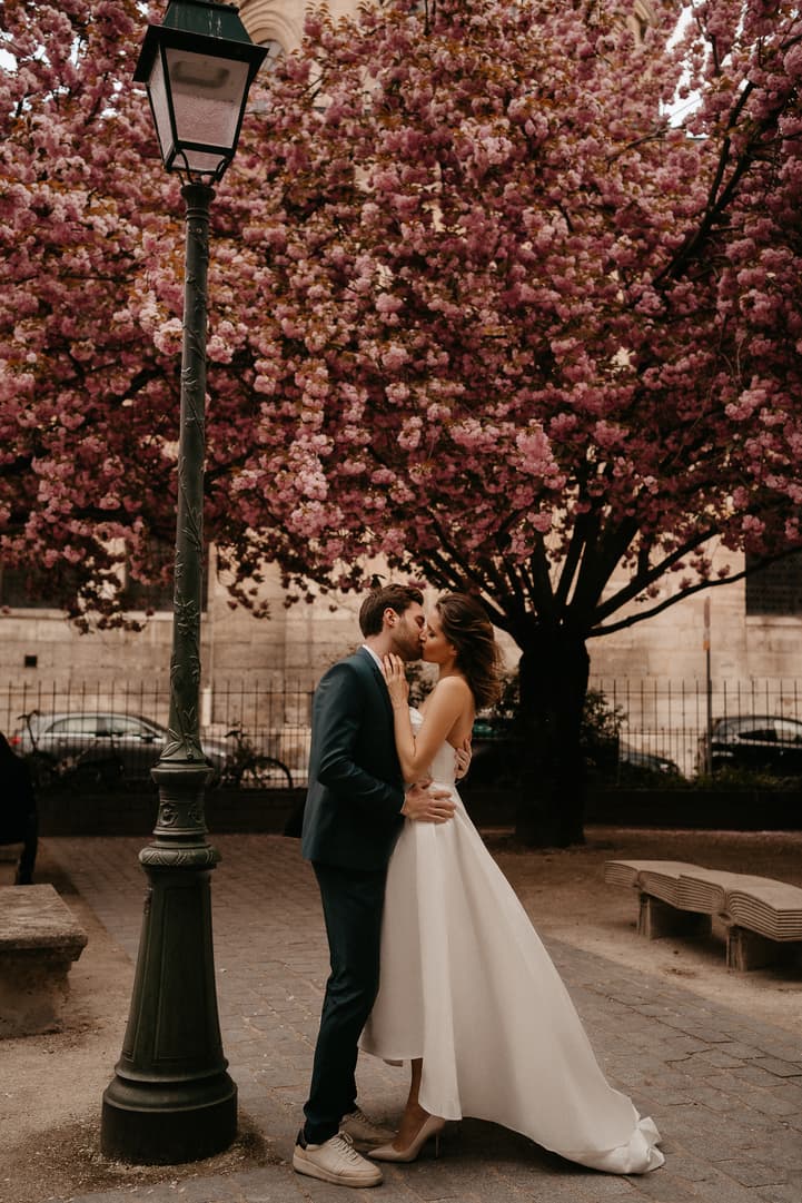 Cherry blossoms spring couple elopement wedding Paris street photoshoot