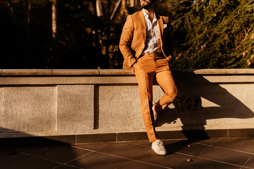 Groom in orange suit