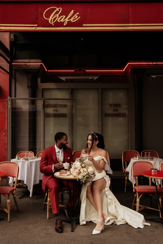Couple Photoshoot in Parisian Café +red suit