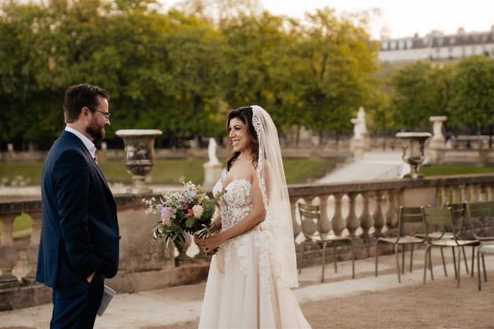 Bride and groom first look in Luxembourg gardens Paris