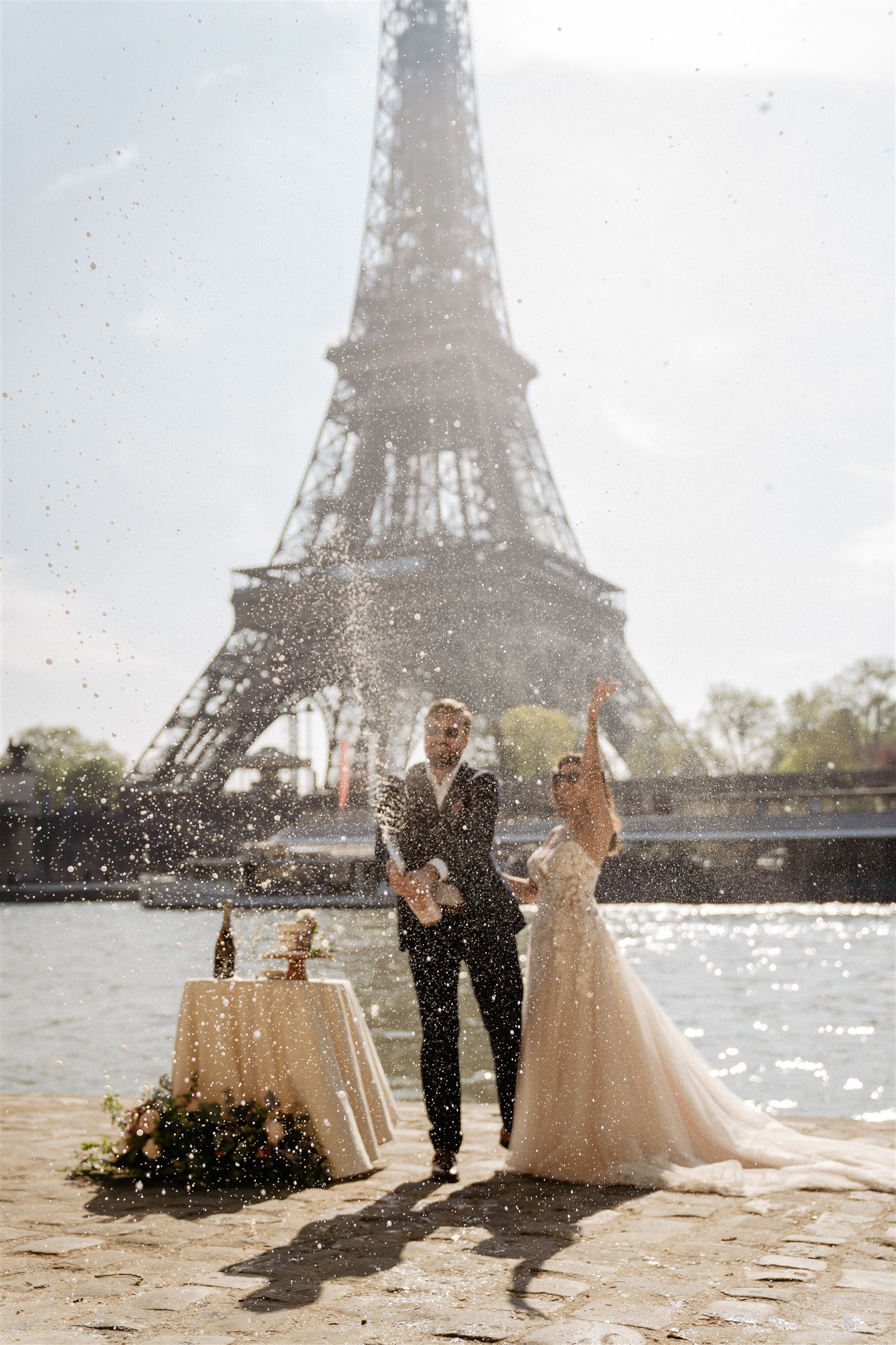 Popping champagne celebration elopement wedding photoshoot