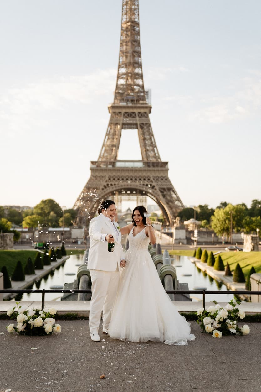LGBTQ wedding elopement ceremony eiffel tower Champagne pop