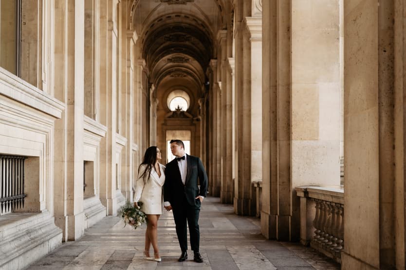 Paris Elopement Packages Elopement Photographer Videographer Louvre hallway couple