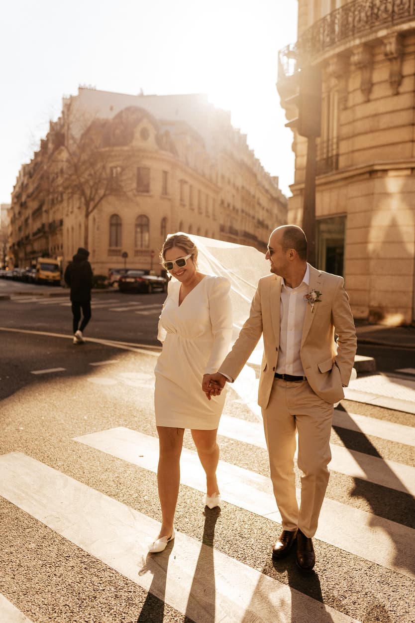 Paris Elopement Packages Elopement Photographer Videographer winter elopement couple in the street walking Paris 