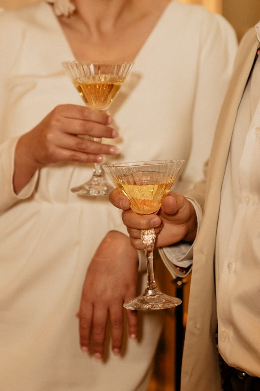 Paris Elopement Packages Elopement Photographer Videographer winter elopement couple having wine at Saint James Paris 