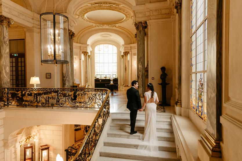 couple shoot at golden staircase in Shangrila hotel
