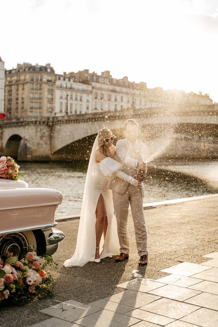 couple having fun in their Paris elopement sunrise