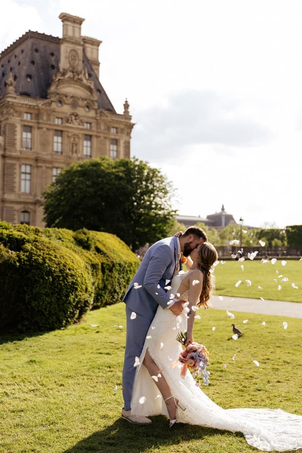 wedding exit kiss with petals toss elopement wedding in Paris