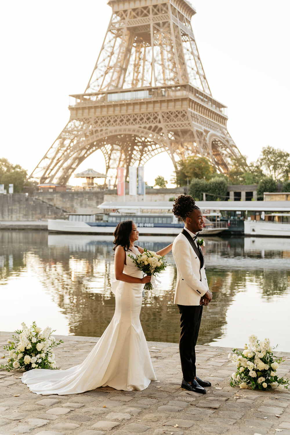 paris elopement first look by the Seine river sunrise