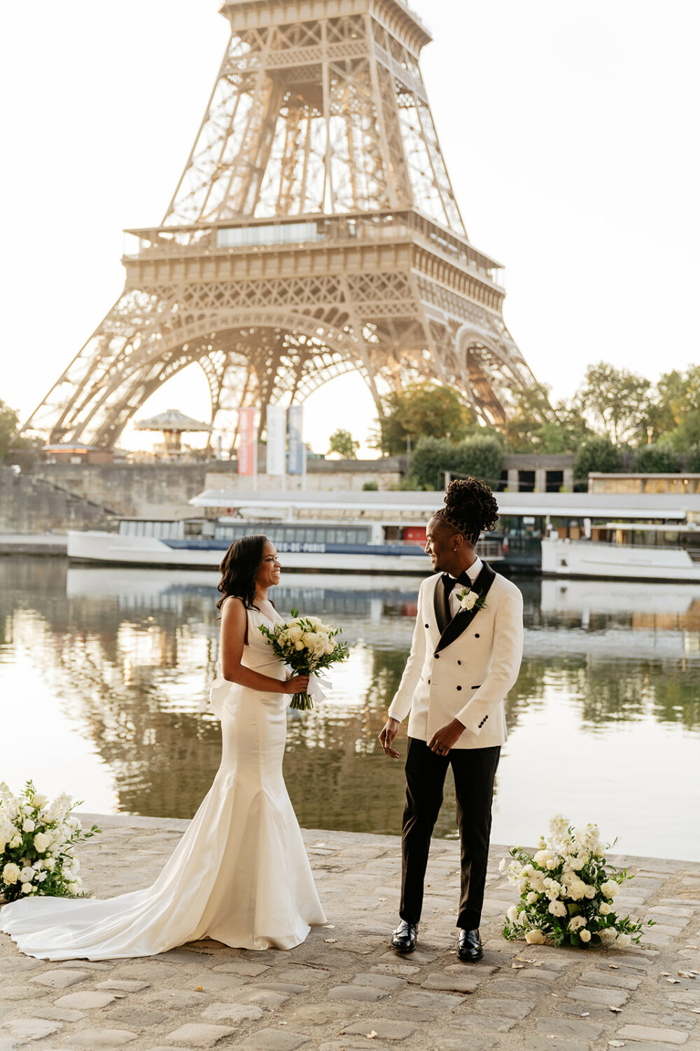 paris elopement first look by the Seine river sunrise