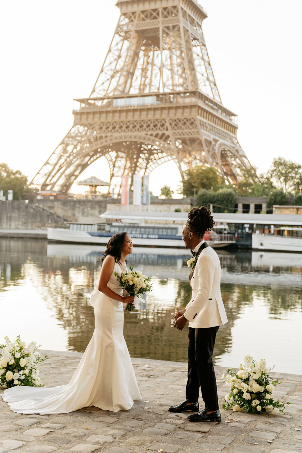 paris elopement first look by the Seine river sunrise