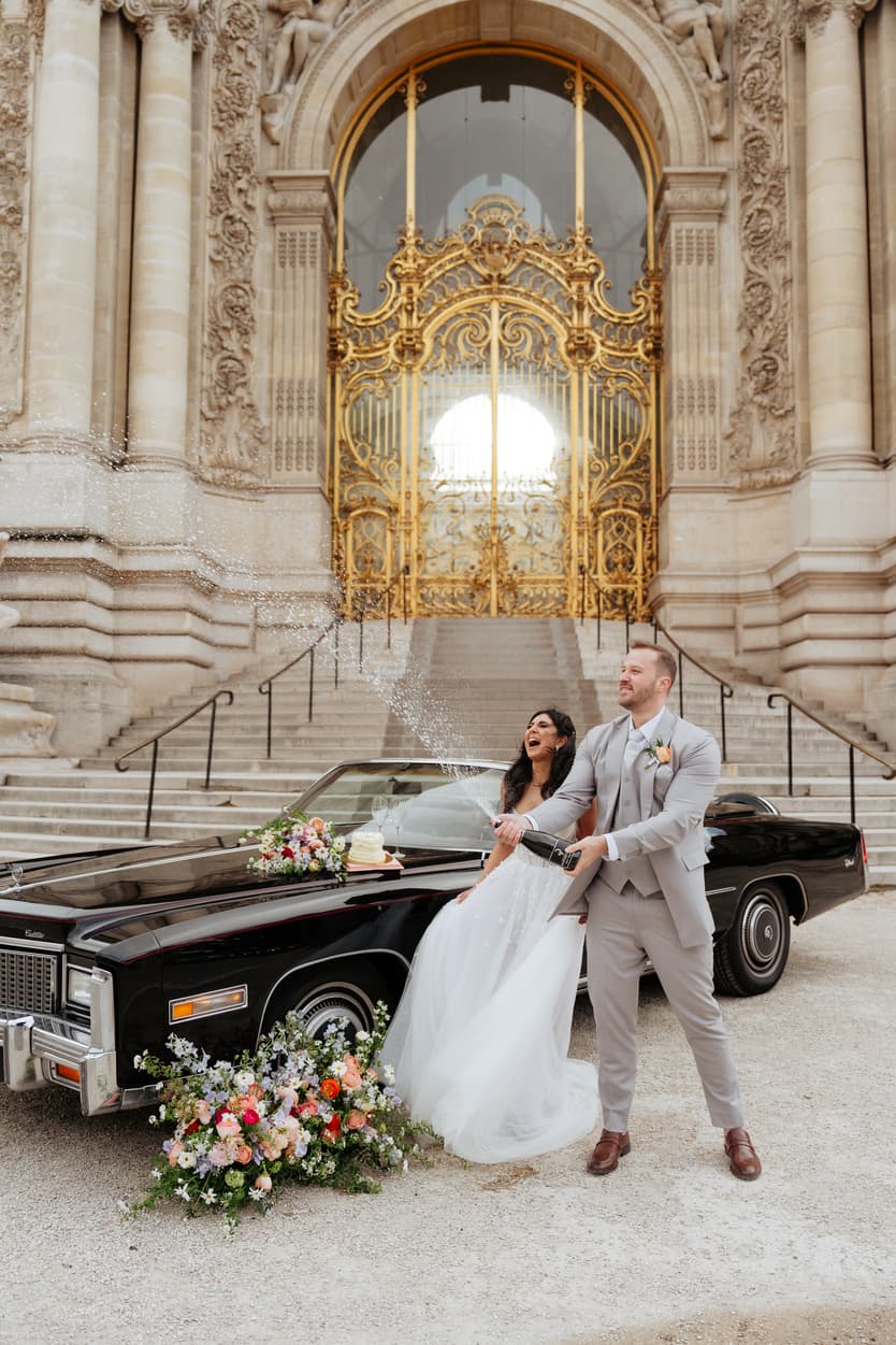 Paris elopement popping champagne