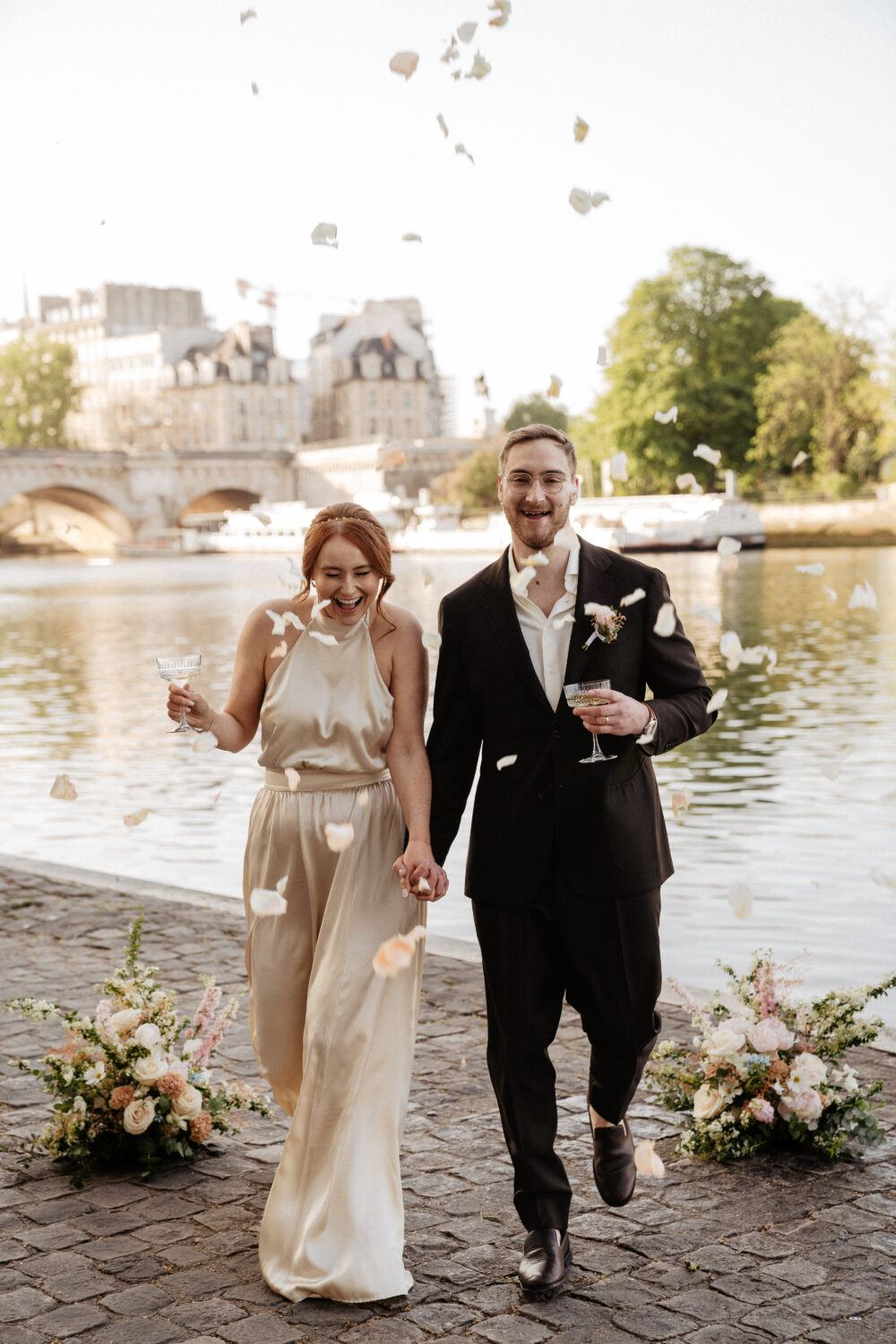 spring paris elopement pont neuf petal shower