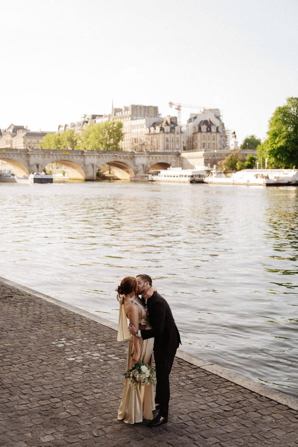 Spring Paris elopement pont neuf couple kissing
