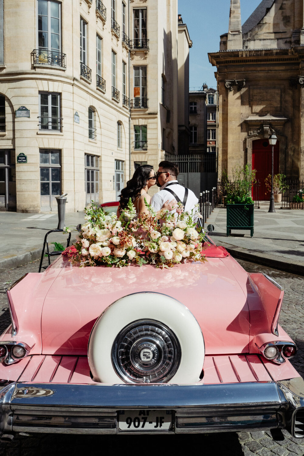 Pink vintage elopement car in Parisian street