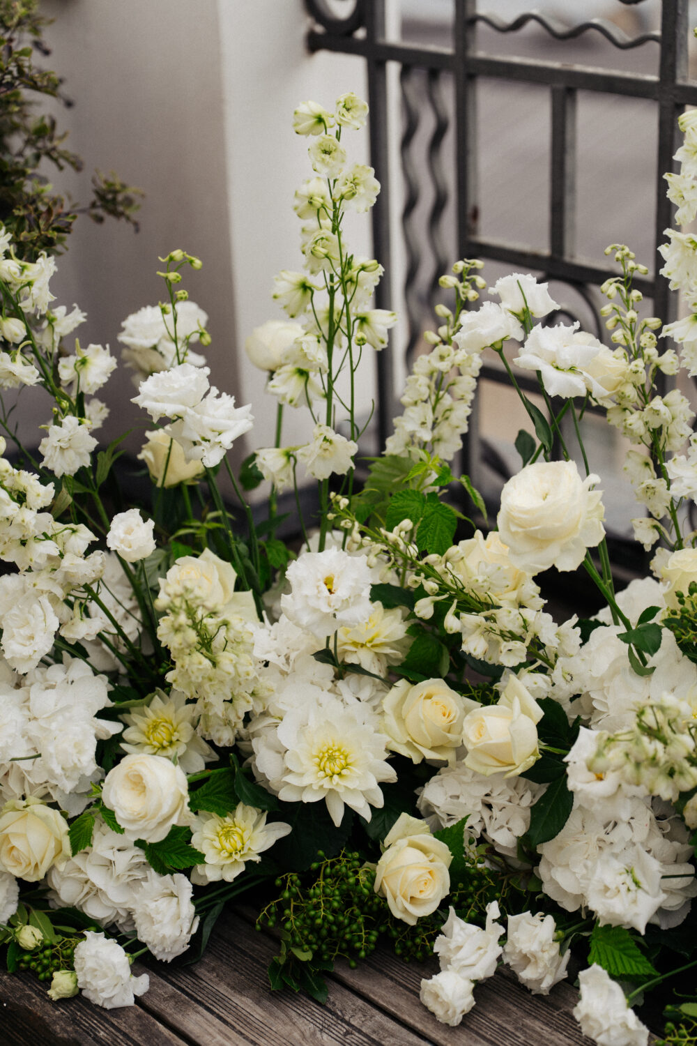 Paris rooftop elopement flower arrangement at Hotel Marignan with eiffel tower view
