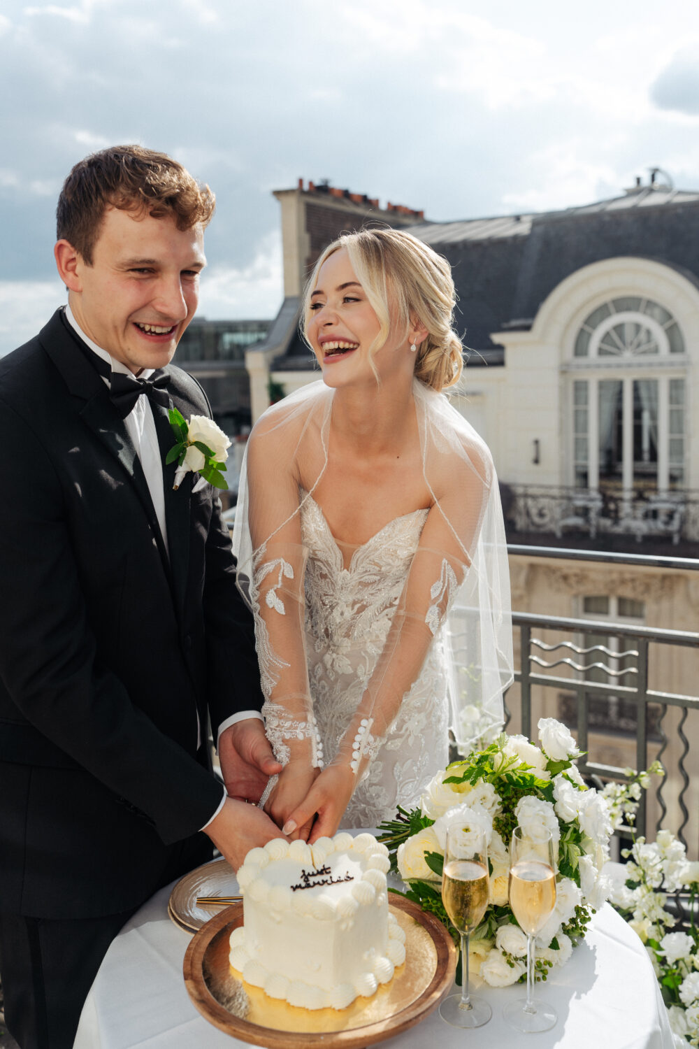 Elopement cake cutting at Hotel Marignan Paris with Eiffel Tower view