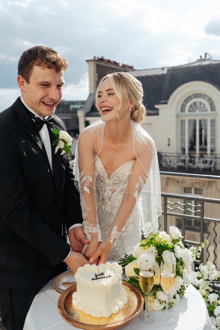 Elopement cake cutting at Hotel Marignan Paris with Eiffel Tower view