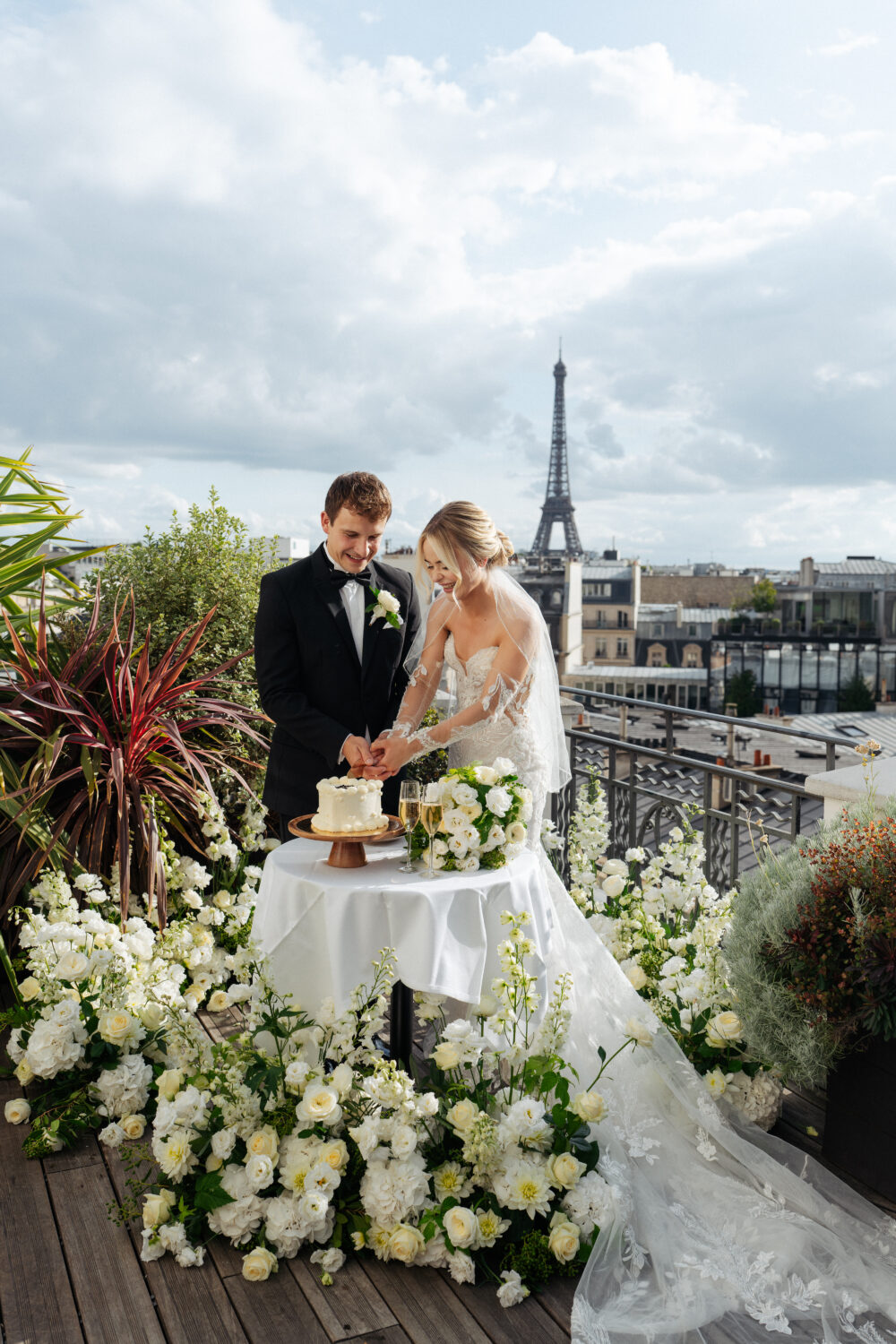 Elopement cake cutting at Hotel Marignan Paris with Eiffel Tower view