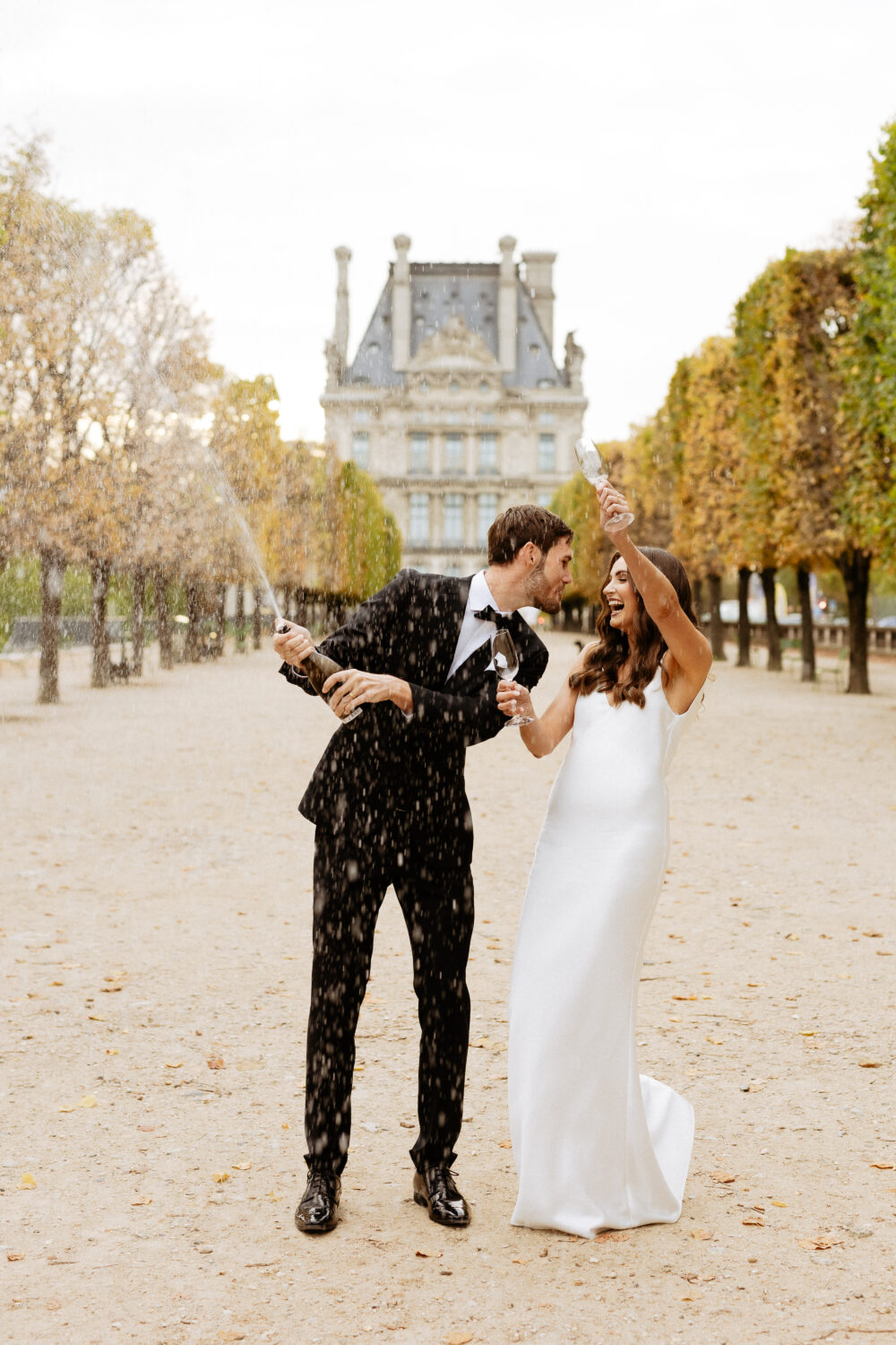 Champagne shower autumn elopement Tuileries Garden Paris
