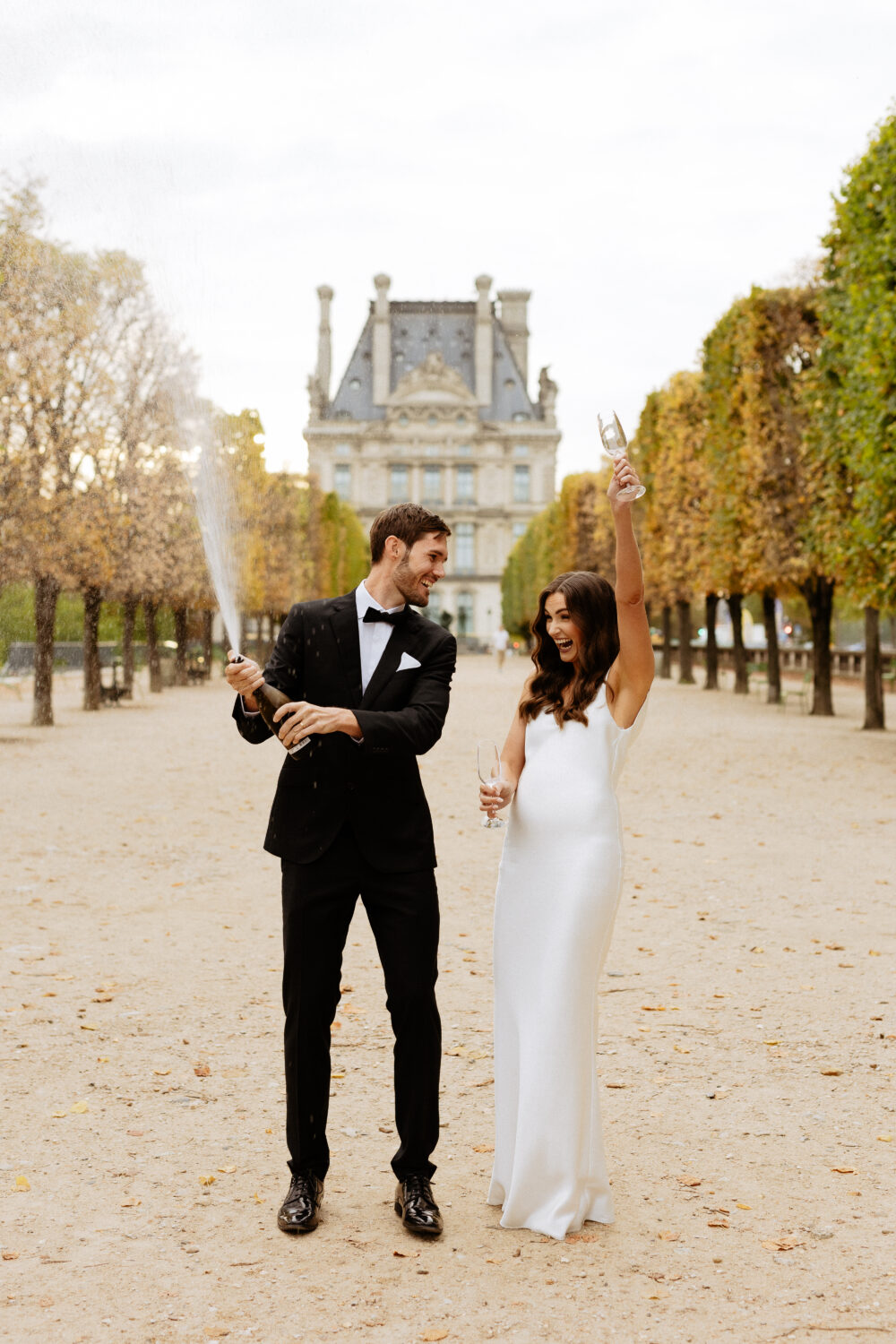 Champagne shower autumn elopement Tuileries Garden Paris