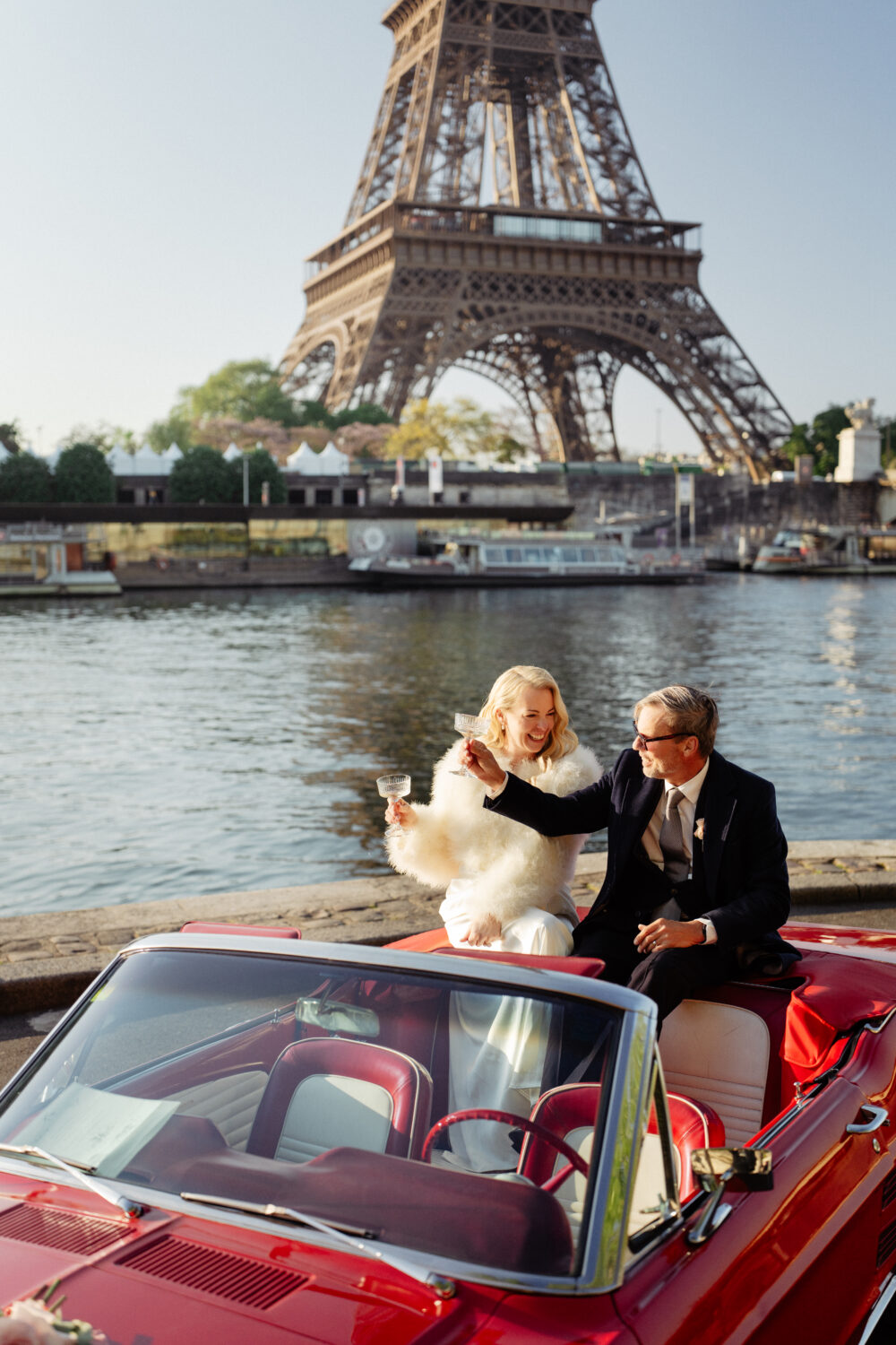 old money style elopement paris eiffel tower red vintage car