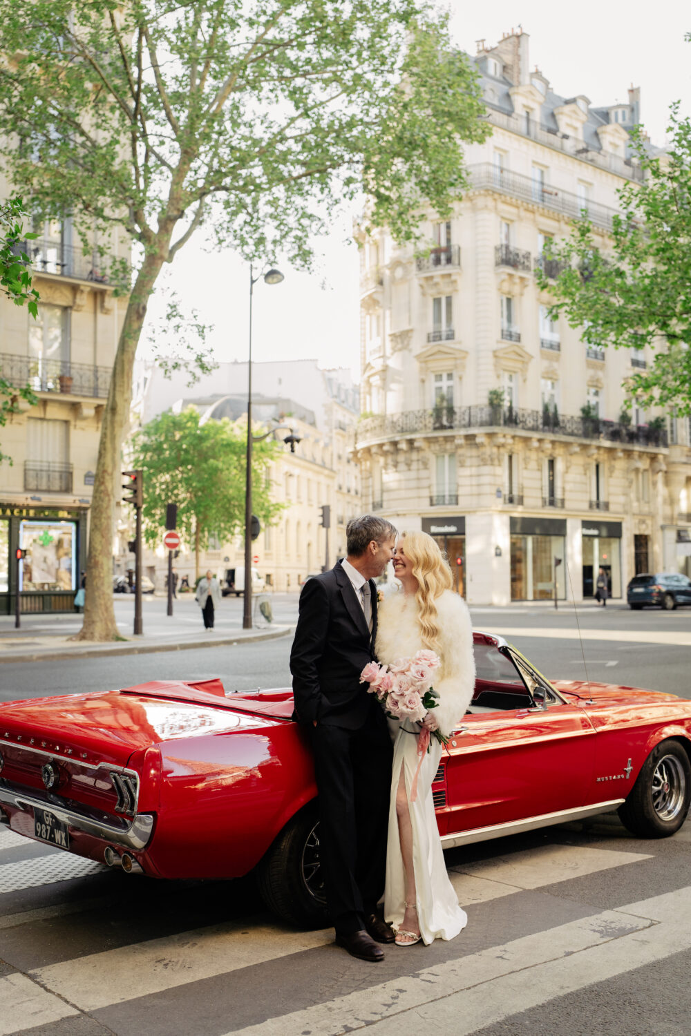 old money style elopement paris eiffel tower red vintage car