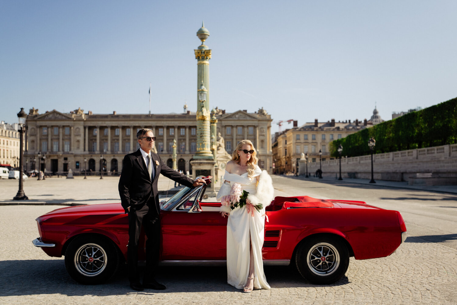 old money style elopement paris red vintage car place de la concorde