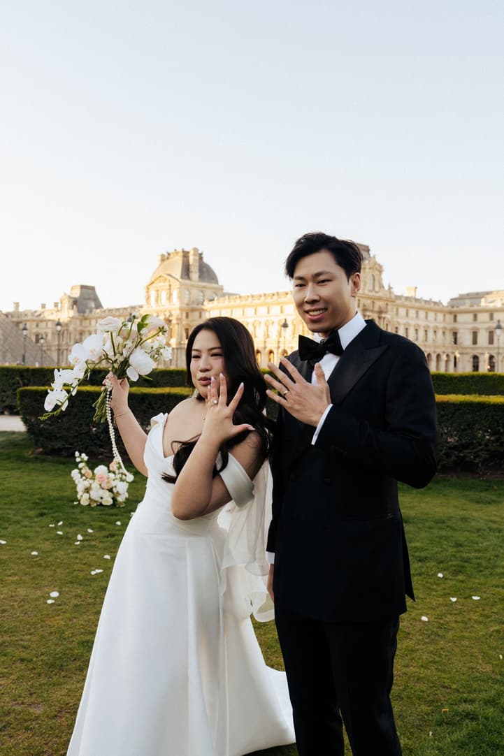 Nancy and Jason showing their wedding rings after their Paris elopement ceremony