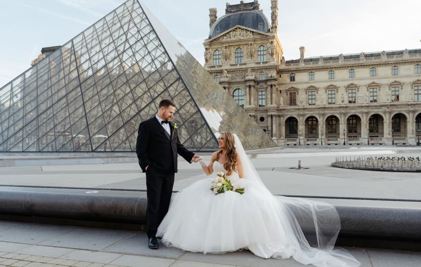 Michael and Aphrodite by the glass pyramid of the Louvre