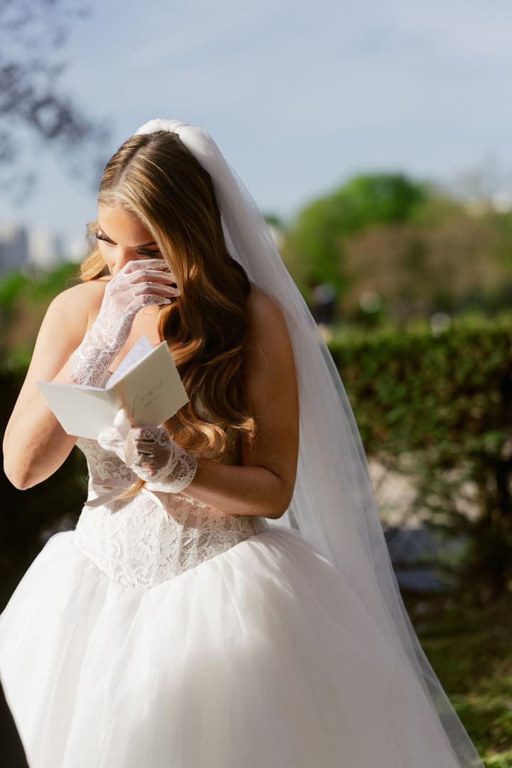 Aphrodite wiping a tear during their wedding vows