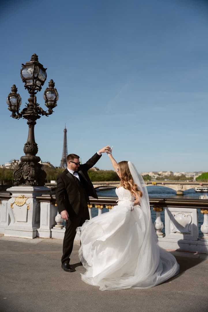 Michael twirling Aphrodite on Pont Alexandre III