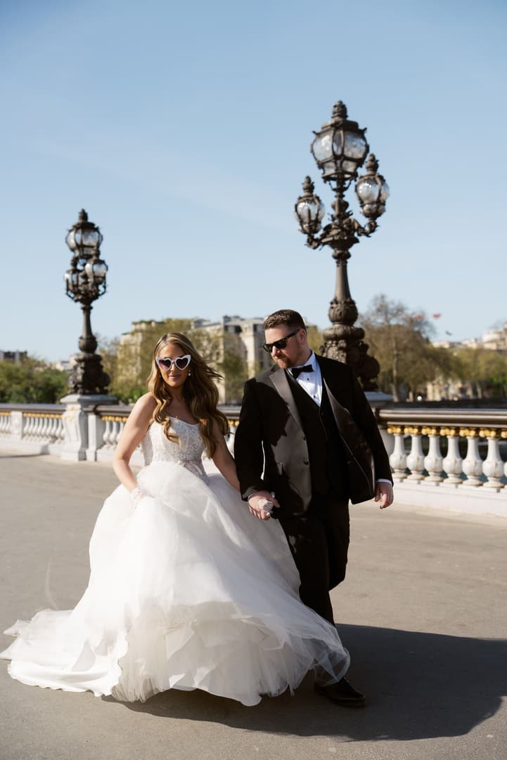 Aphrodite and Michael walking across Pont Alexandre III