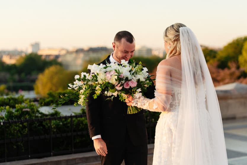 Tyler turns around and sees Victoria in her wedding gown for the first time, on the Trocadéro at sunrise