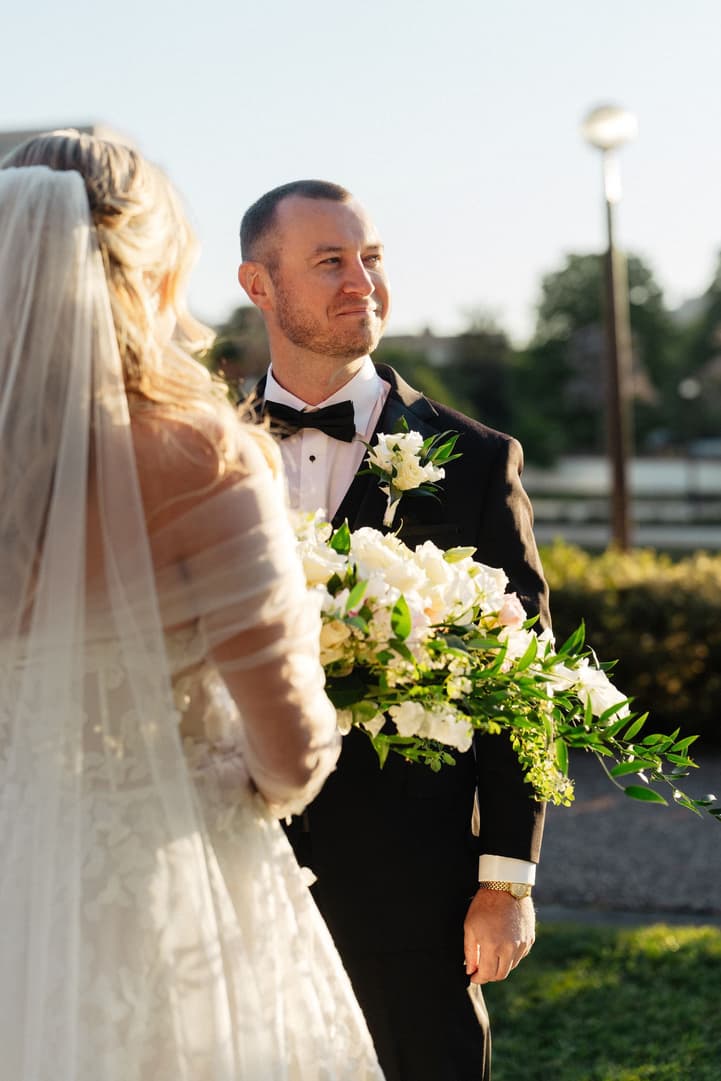 Tyler smiles at Victoria as she reads her vows during their Paris elopement ceremony