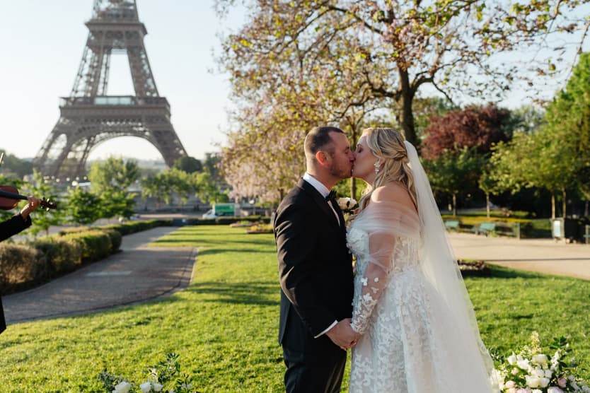 Victoria and Tyler's first kiss as newlyweds in the Trocadéro gardens with the Eiffel Tower