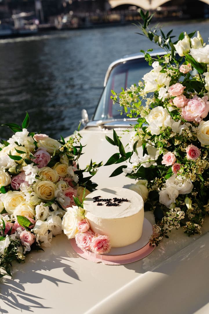 Victoria and Tyler's cake, Forever Begins in Paris, among the flowers on the white vintage car